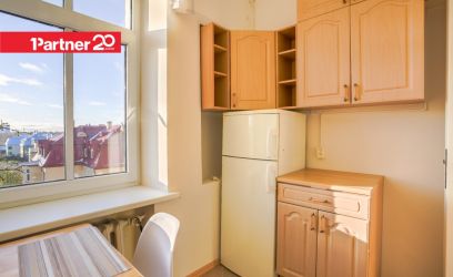 Pilte Hubane korter ajaloolises majas. Vaade vanalinnale