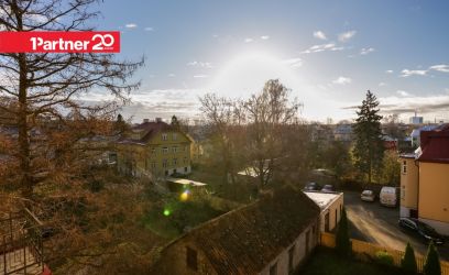 Pilte Hubane korter ajaloolises majas. Vaade vanalinnale